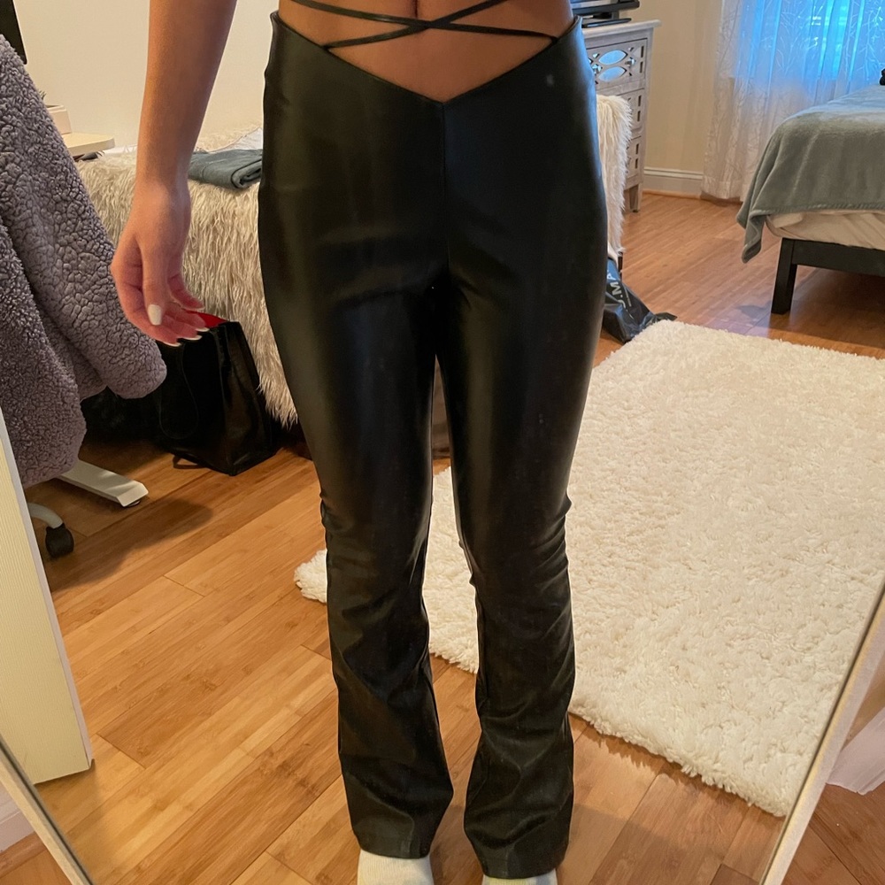 I am Gia black leather pants tie. Bootcut fit and flare